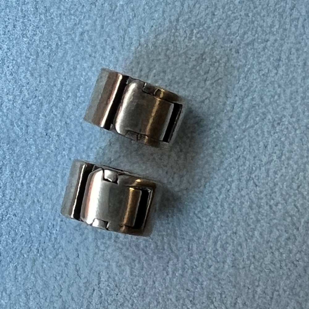 Chamilla, 925 Sterling silver . Set of (2) stoppers for charm bracelet.